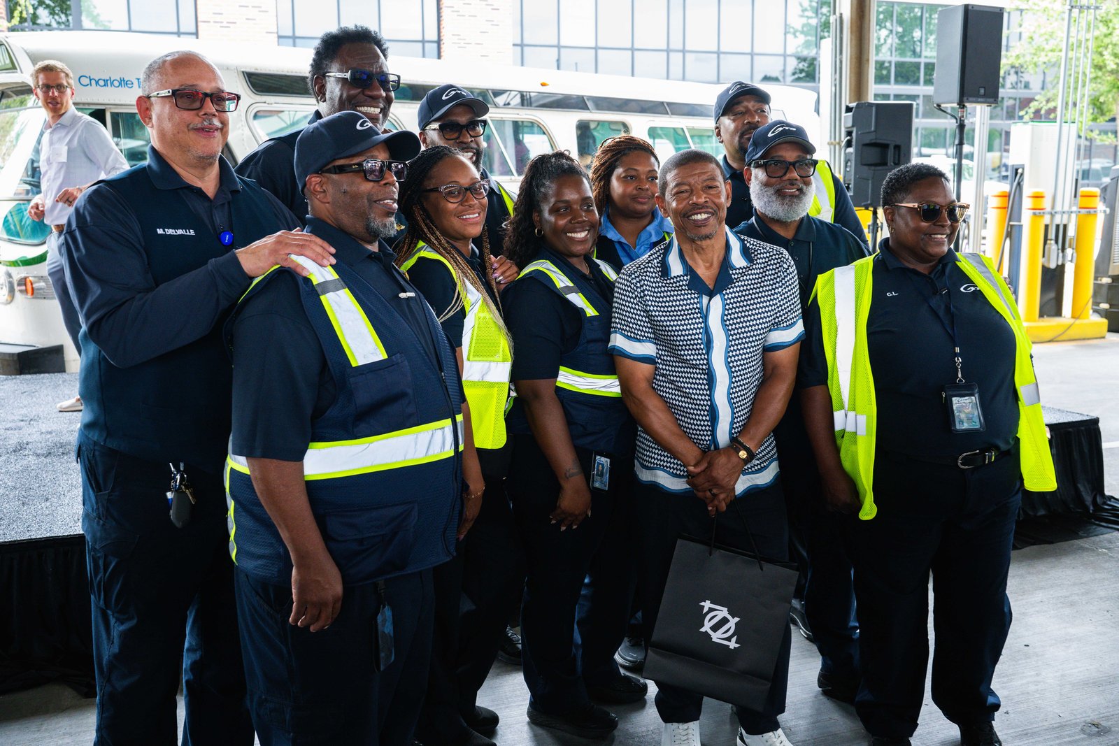 CATS drivers and staff posing together during the agency's 50th anniversary celebration